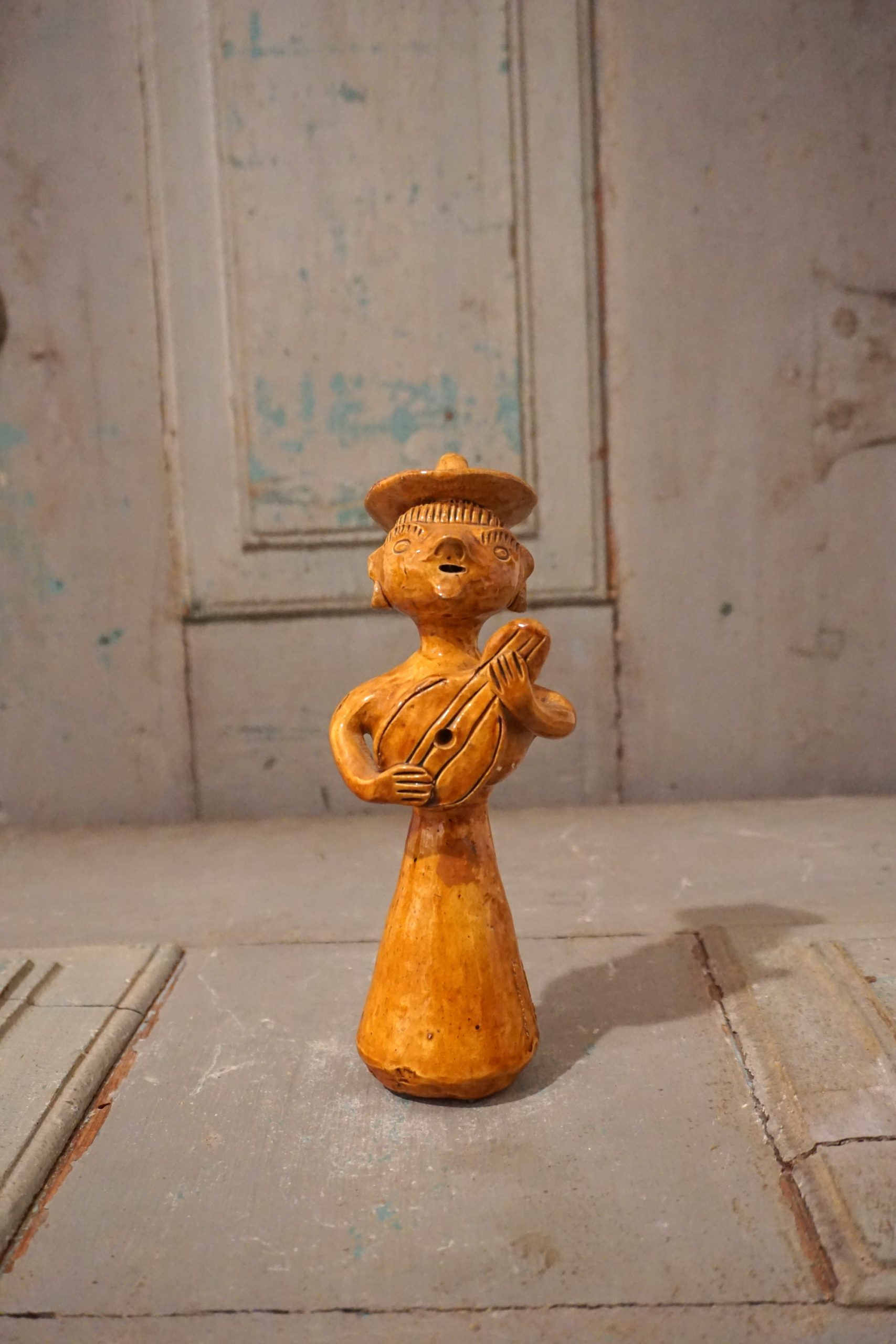 Figure with guitar
