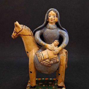 Mulher c/ menino a cavalo