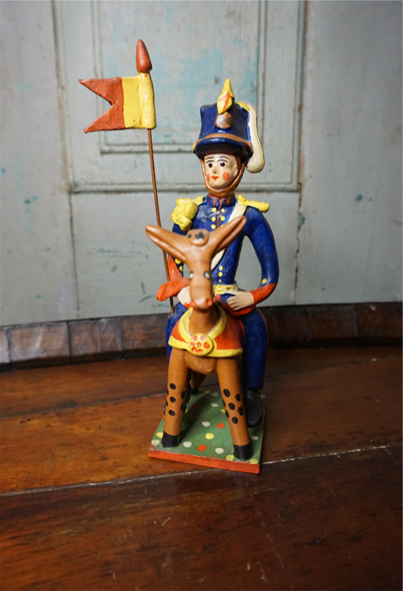 Soldado com bandeira a cavalo